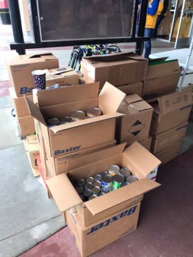 Boxes of canned food raised at Saturday's 'Movies with Santa" sponsored by Lemoore Stadium Cinemas and the Kings Lions Club.